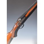 Denton & Kennell 20 bore side by side shotgun with engraved scenes of dogs to the locks, engraved