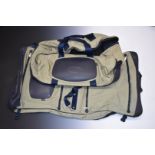 Land Rover suit bag with additional compartments and a similar holdall