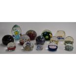 Fourteen various glass paperweights including Stuart Abelman iridescent, Mdina, Whitefriars,