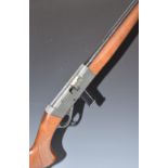 Anschutz Model 525 .22 semi-automatic rifle with chequered semi-pistol grip, extended magazine,