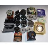 A large collection of trout fishing fly reels, lines and sunglasses including Okuma, together with a