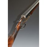 AYA No.2 sidelock side by side ejector shotgun with all over scrolling engraving, chequered grip and