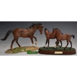 Two Royal Doulton horses