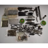 A collection of Acvoke air pistol parts including barrels, trigger mechanism, springs etc, likely