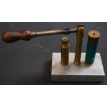 10 bore shotgun cartridge capper and decapper with turned wooden handle.