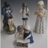 Four Copenhagen child figures, tallest 19cm