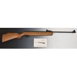 SMK 19 Super Grade .22 air rifle with semi-pistol grip, raised cheek piece and adjustable sights,