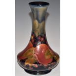 Moorcroft pedestal vase decorated in the Pomegranate pattern, signed to base, 16.5cm