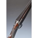 Charles Ingram 12 bore side by side ejector shotgun with named and engraved locks, engraved