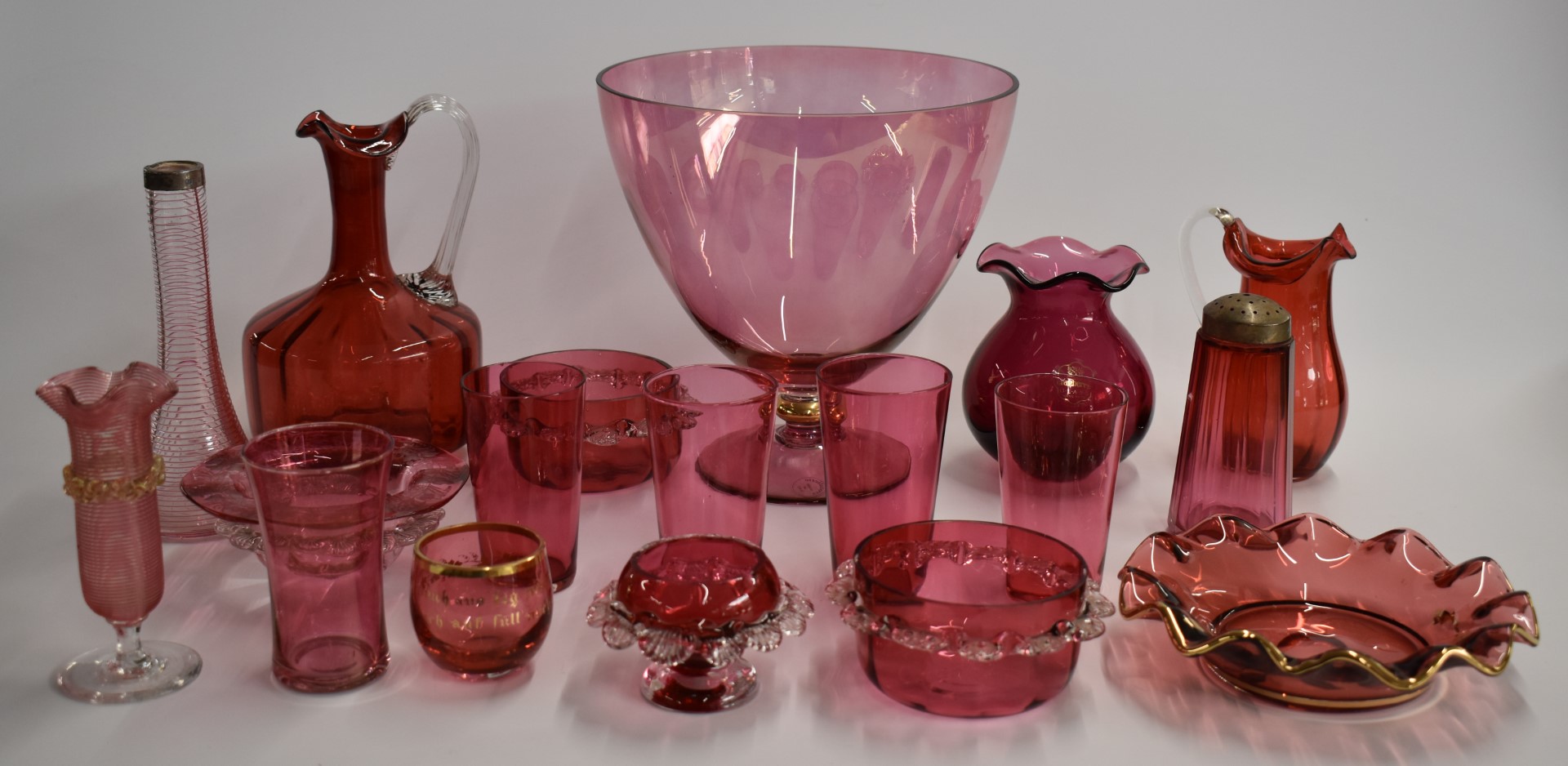 A collection of cranberry glass including enamelled, cut glass, and silver mounted examples, largest - Image 5 of 6