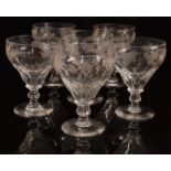 A set of six clear cut glass ale glasses with engraved decoration of barley and hops, raised on