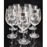 A set of eight Dartington F200/35 red wine glasses, new with stickers in original box, 23cm tall.
