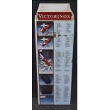 Victorinox rotating shop display advertising cabinet, each side displaying models and specifications