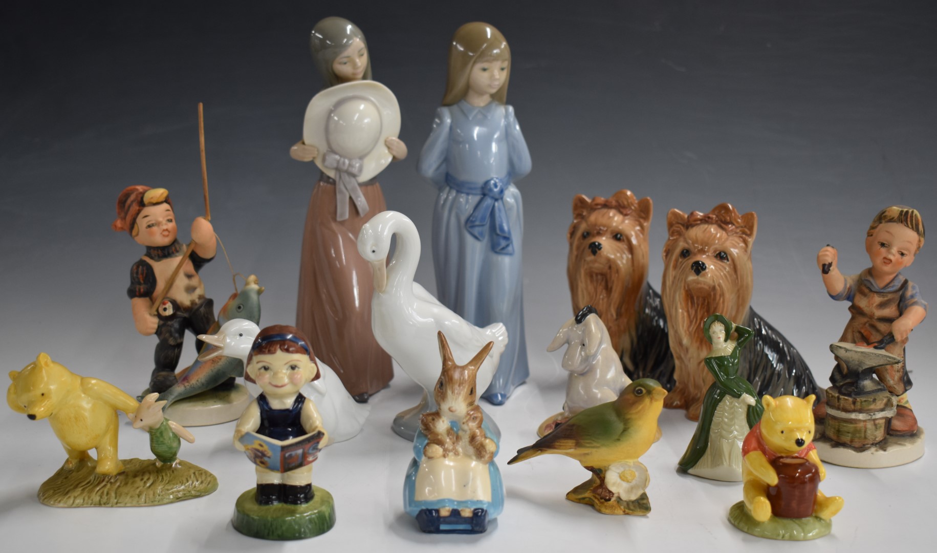 Lladro, Nao, Goebel Hummel, Sylvac, Beswick and Royal Doulton figures, tallest 25cm