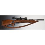 Theoben .22 air rifle with custom thumb hole stock, raised cheek piece, braided leather sling, sound
