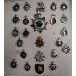 Twenty-four police badges including Gloucestershire, Swansea, Parks Constabulary, Norfolk, South