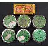 Six F Joyce & Co percussion cap tins with paper labels together with an empty ICI rim fire cartridge