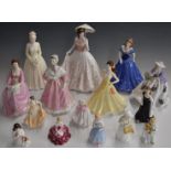 A collection of approximately fifteen figurines including Royal Worcester, Coalport, Royal Doulton