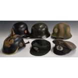 Five German WW2 replica helmets / caps including Army M42 field cap, SS steel helmet, together