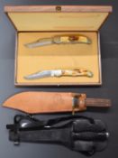 A cased pair of Ka-Bar folding pocket knives, Ka-Bar Bowie knife with 21cm blade and leather