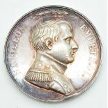 A white metal Napoleon coin / medal by Denon, with profile of Annibal verso, diameter 4cm
