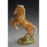 Beswick rearing horse in palomino colourway, model 1014, H28cm