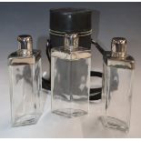 Leather cased three part glass spirit flask set, H18.5cm