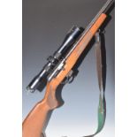 BRNO Model 2-E-H .22 semi-automatic rifle with chequered semi-pistol grip, magazine, leather