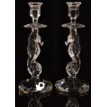 A pair of Waterford Crystal figural candle sticks in the form of seahorses one with original