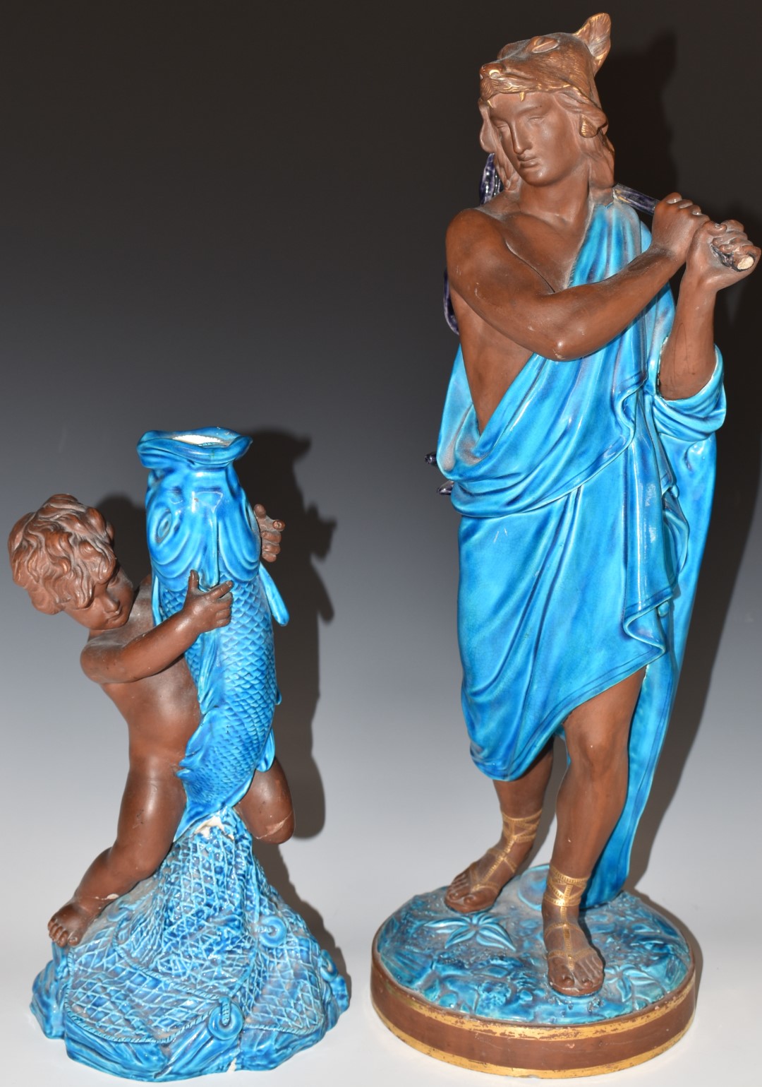 Two Royal Worcester majolica figures Hunter and Fisher Boy