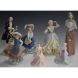 Three Lladro and two Coalport figurines, a Wedgwood Little Bo Peep and a Royal Dux musician, tallest