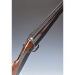 E J Churchill 12 bore side by side ejector shotgun with scrolling engraving to the named locks,