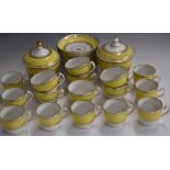 Approximately 28 pieces of 19thC English porcelain tea ware, with gilt decoration on a yellow