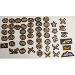 Approximately fifty British Army trade / qualification cloth badges including marksman, physical