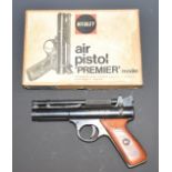 Webley Premier .22 air pistol with wooden grips and original Bakelite grips, in original box.