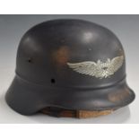 German WW2 Third Reich Nazi Civil Defence helmet with 'Luftschutz' logo to front, stamped Q68 and