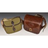 Two shotgun cartridge bags, one a larger handmade brown leather loader's bag, the other Bisley