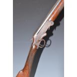 English .410 folding poacher's shotgun with chequered grip and forend and 28 inch barrel, overall