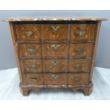 18thC Dutch marquetry inlaid serpentine fronted chest of four drawers with removable mirror,
