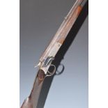 Holland & Holland .250 hammer action rook rifle with chequered semi-pistol grip and forend, pop-up
