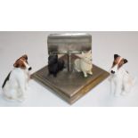 Two Royal Doulton K Series dog figures and a Buchanan's 'Black and White' Scotch Whiskey figural dog