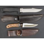Two hunting or similar knives Kershaw 1010BK with 16cm blade and rubber handle and Whitby with