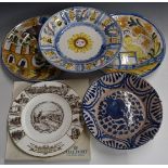 Four contemporary Maiolica chargers / bowls, largest diameter 34cm and a Coalport plate