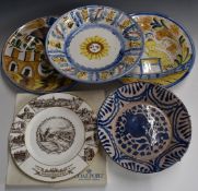 Four contemporary Maiolica chargers / bowls, largest diameter 34cm and a Coalport plate