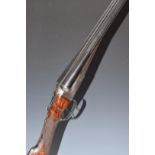 Thomas Turner 12 bore side by side shotgun with scrolling engraving to the locks, trigger guard,