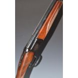 Baikal 12 bore over and under ejector shotgun with engraved lock, trigger guard and underside,