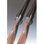 A pair of James Purdey & Sons 12 bore self-opening sidelock side by side ejector shotguns, each with