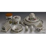Approximately nineteen pieces of Portmeirion Botanic Garden dinner ware including a toast rack,