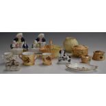A collection of Royal Worcester miniatures, Staffordshire figural pen holders, Chelsea style