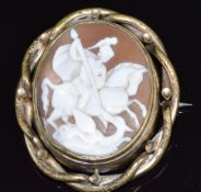 Victorian brooch set with a cameo depicting George and the dragon, verso a glass compartment, 5 x